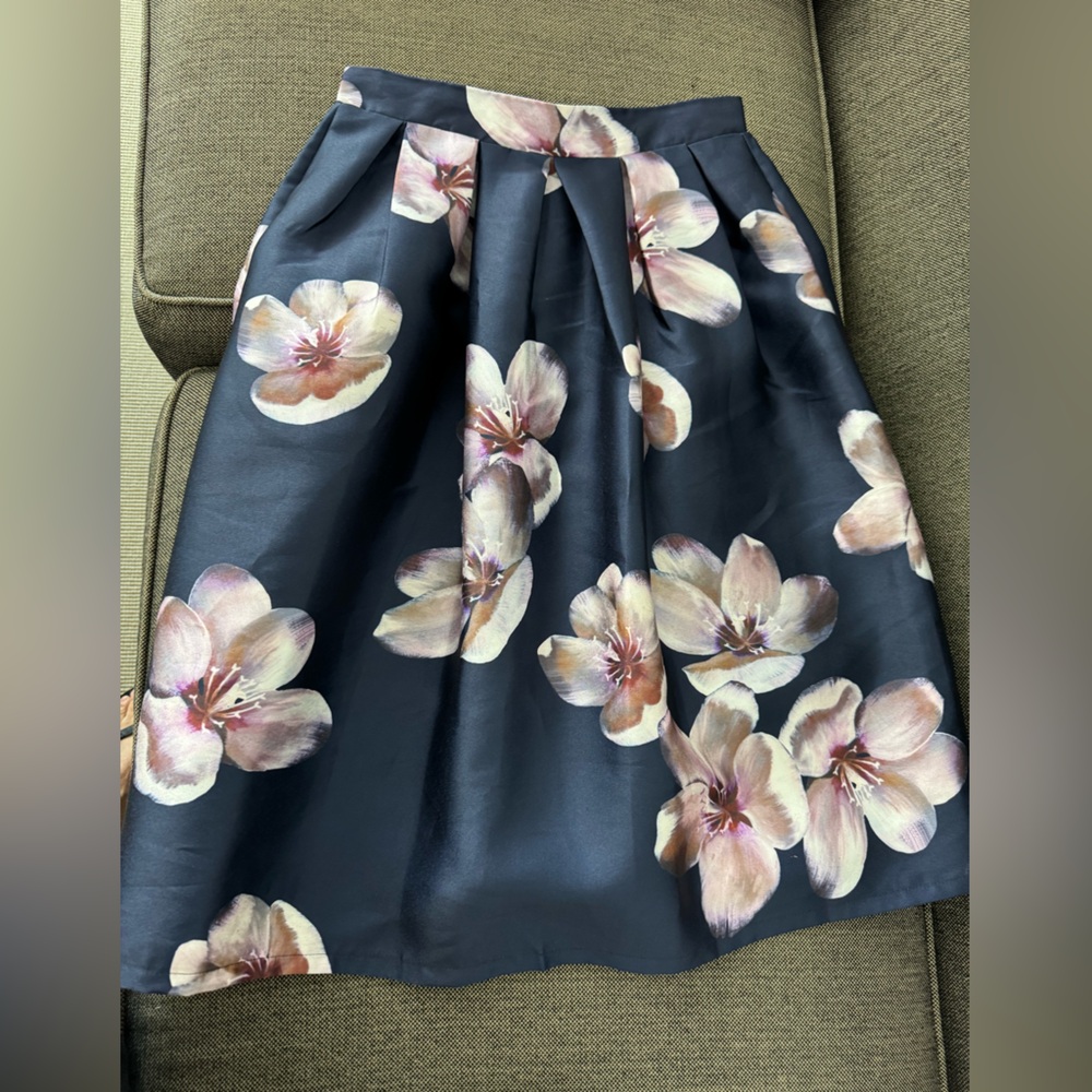 Eye of the needle midi skirt